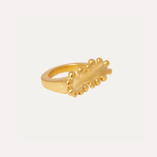 Chunky gold-vermeil ring with an organic shape.