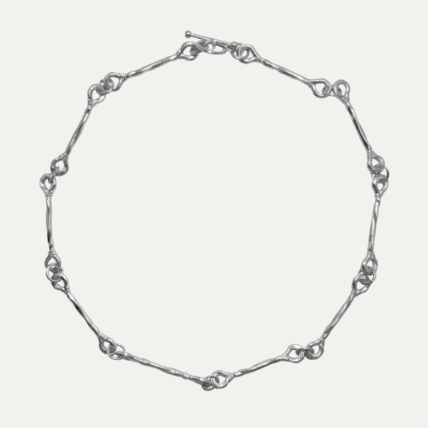 A recycled sterling silver choker necklace with adjustable length.