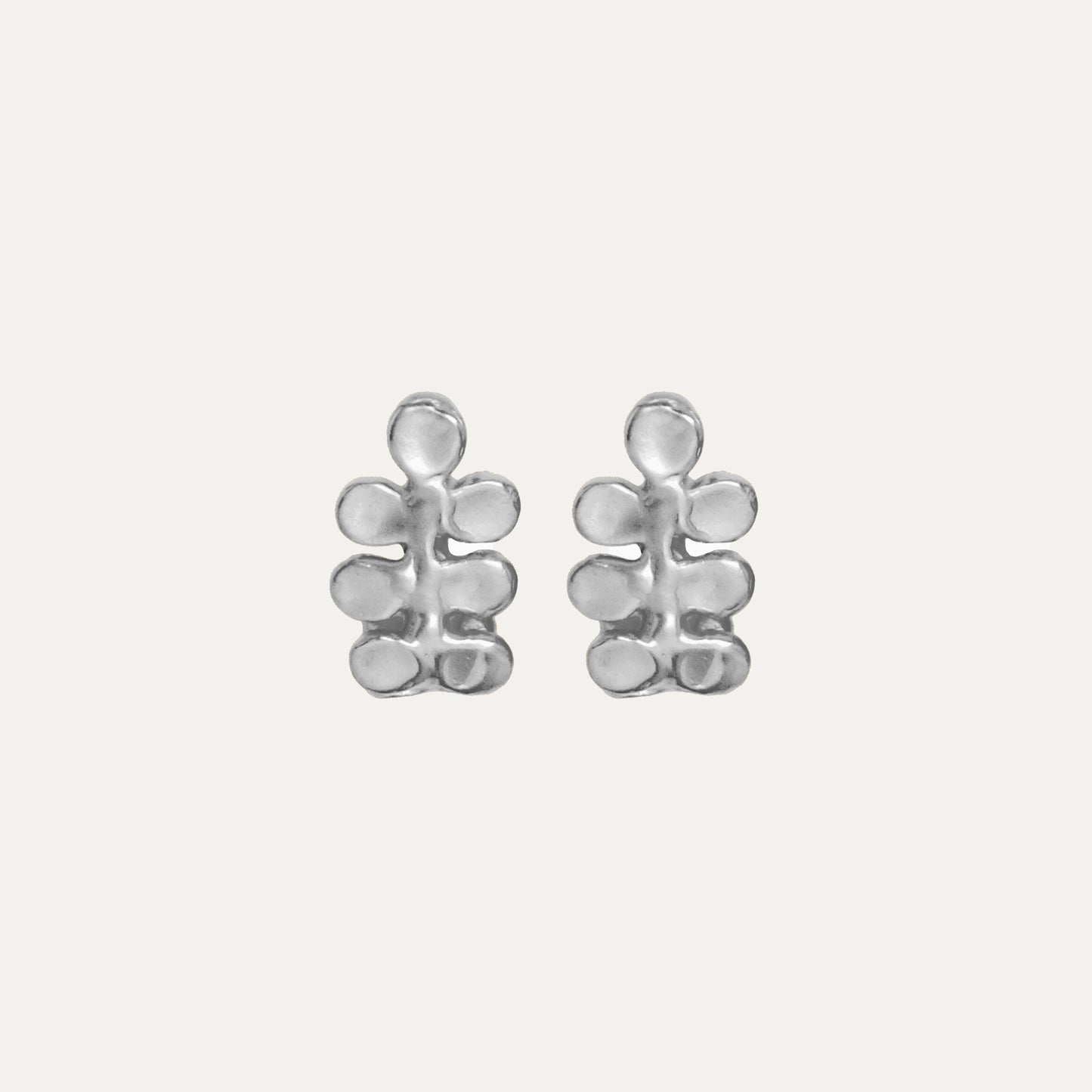 Sterling silver stud earrings, cast from hand carved wax.